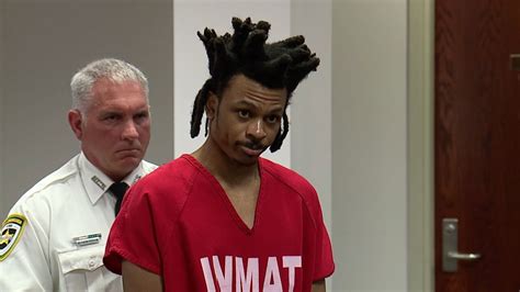 Ronnie O’Neal arrives in court Monday. He is accused of killing his girlfriend, Kenyatta Brown, and their 9-year-old daughter, then trying to kill his 8-year-old son in March 2018.